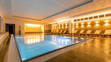 Indoor pool, a heated pool, open 9:00 AM to 9:00 PM, sun loungers