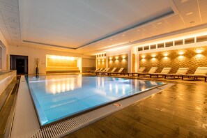 Indoor pool, a heated pool, open 9:00 AM to 9:00 PM, sun loungers