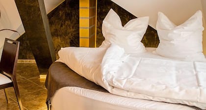 Alpha & Omega Hotel