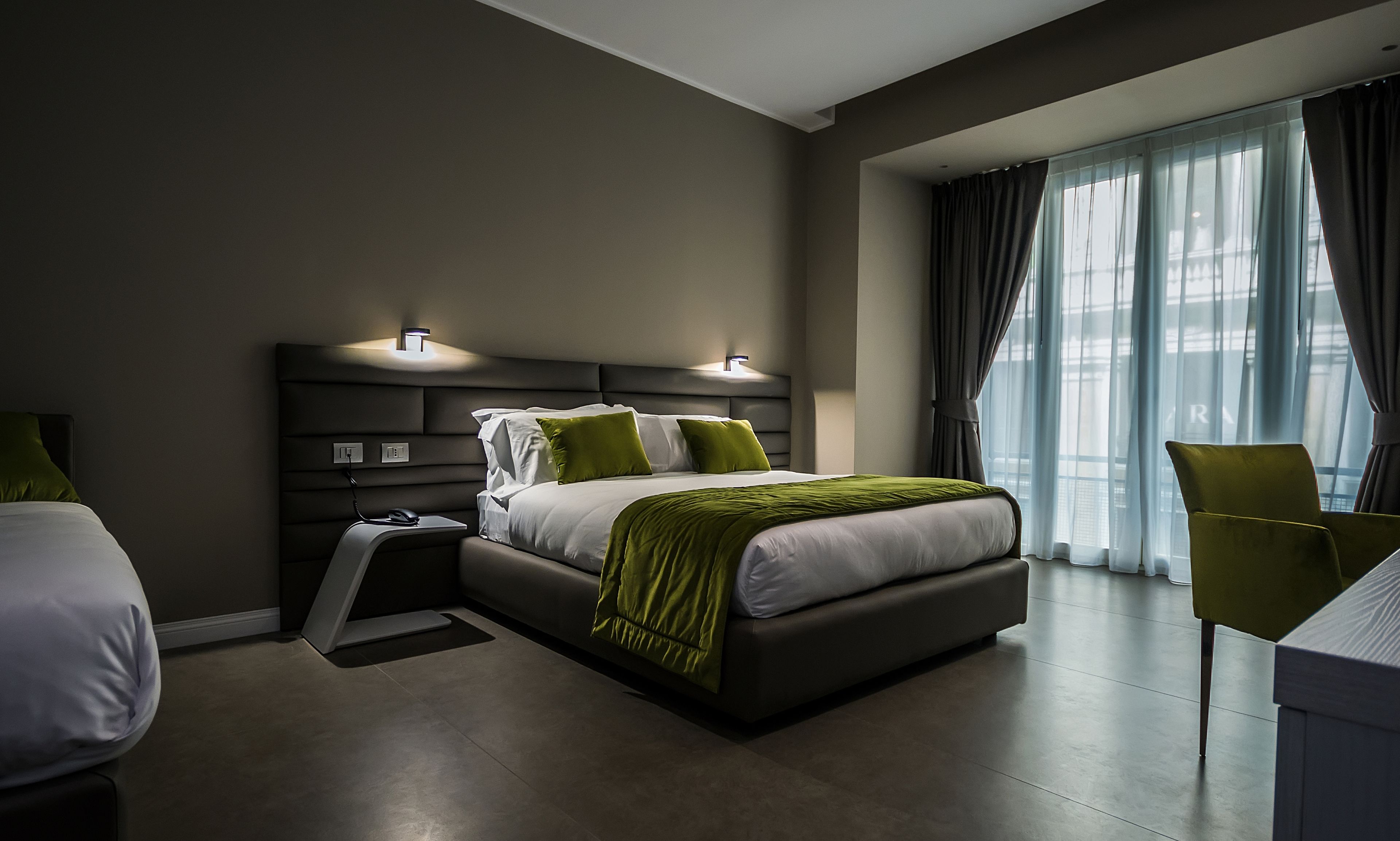 deluxe room | minibar, in-room safe, desk, blackout curtains