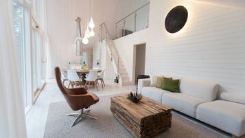 Lyxstuga - 2 sovrum - bubbelbad - viss havsutsikt | Vardagsrum