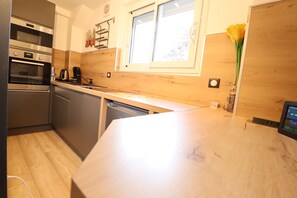 Studio Supérieur, salle de bains privée | Cuisine partagée