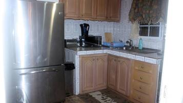 Condo, Multiple Beds (DREAM VACATION ST CATHERINE JAMAICA -) | Private kitchen | Fridge, microwave, cookware/dishes/utensils
