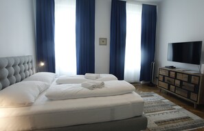 3 bedrooms, desk, iron/ironing board, travel cot