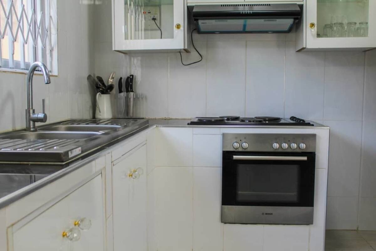 Fridge, microwave, oven, cookware/dishes/utensils