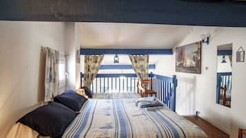 2 habitaciones, tabla de planchar con plancha y ropa de cama