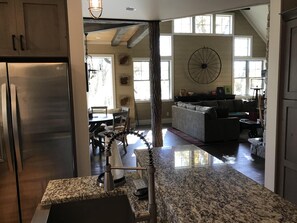 Enjoy a comfortable stay in this inviting space with a modern kitchen, dining area, and cozy living space.