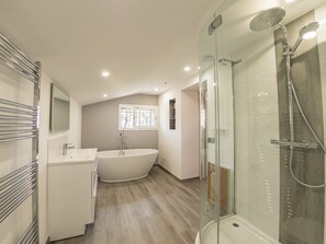 Bathtub, jetted tub, hair dryer, towels