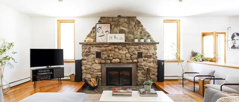 Smart TV, fireplace, books