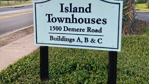 A sign for Island Townhouses at 1500 Demere Road, Buildings A, B & C. - St. Simons Island secret! (St Simons Island)