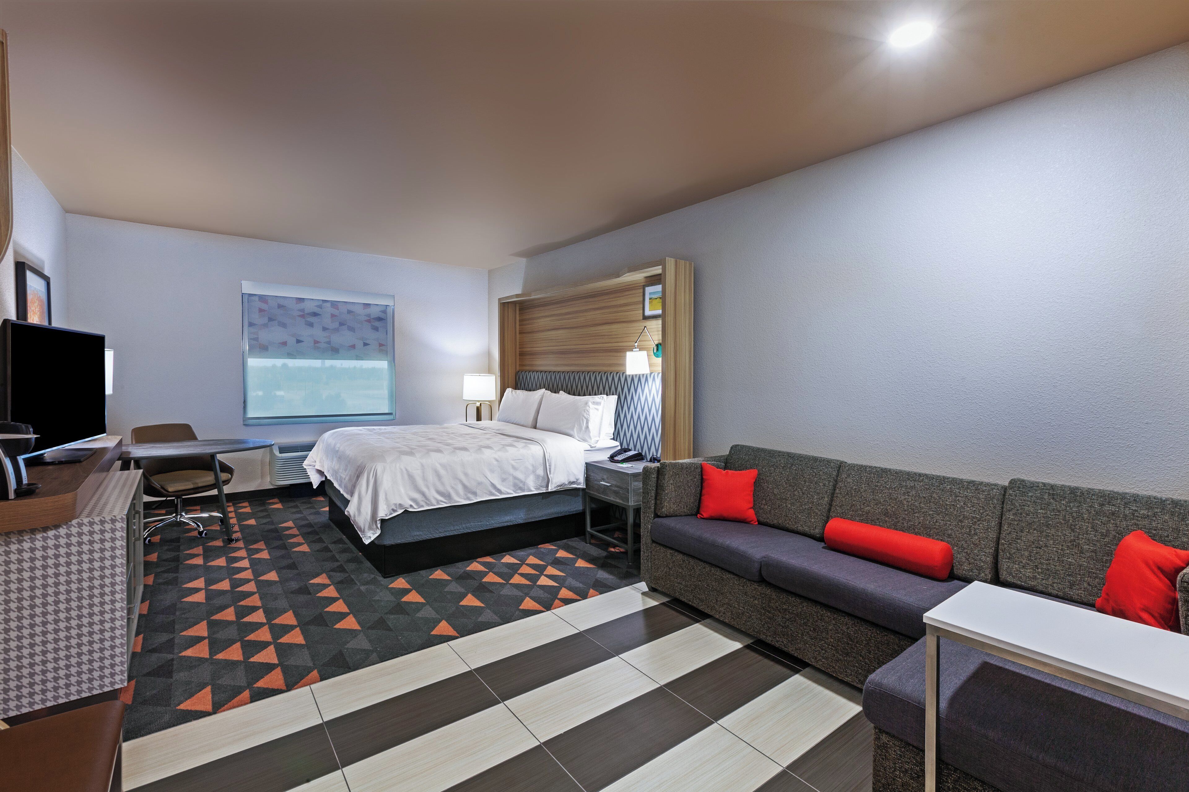 Suite, 1 Bedroom | Desk, laptop workspace, blackout drapes, iron/ironing board