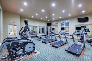 A gym with treadmills, elliptical machines, and free weights. - Holiday Inn Amarillo East by IHG (Amarillo)