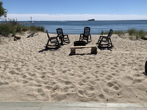On the beach, sun-loungers, beach towels