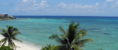 On the beach, sun loungers, beach towels