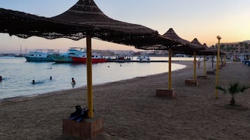 Sun-loungers, beach towels