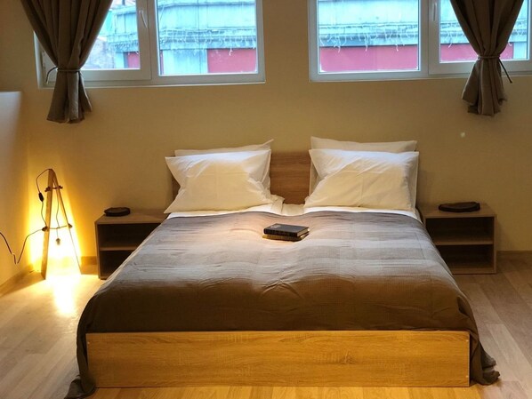 Standard Apartment, 2 Bedrooms, Balcony | Blackout drapes, iron/ironing board, free cribs/infant beds, free WiFi