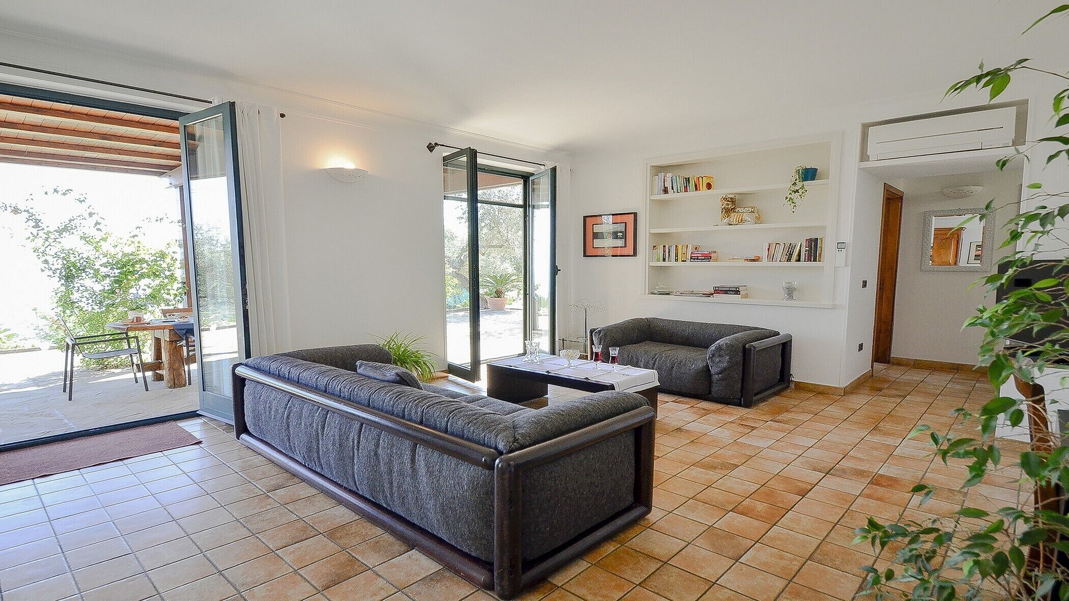 Quality villa with private pool surrounded by flower and plants in Sorrentocoast