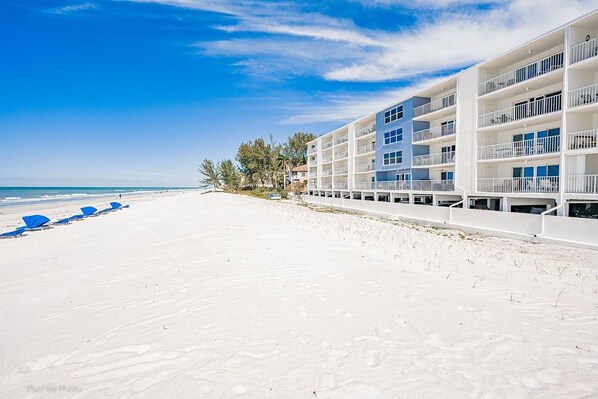 On the beach, sun loungers, beach towels