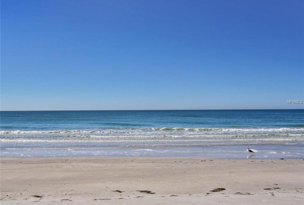 On the beach, sun-loungers, beach towels