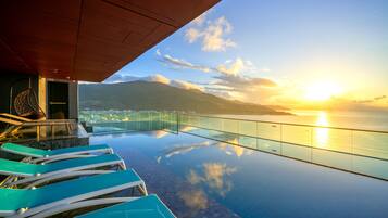 Outdoor pool, open 8:00 AM to 9:30 PM, pool umbrellas, pool loungers