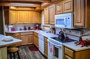 Private kitchen - This 2 bed, 1.5 bath cottage is Rustic, comfortable and cozy! (Long Barn)