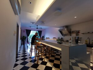 Fridge, electric kettle, cookware/dishes/utensils