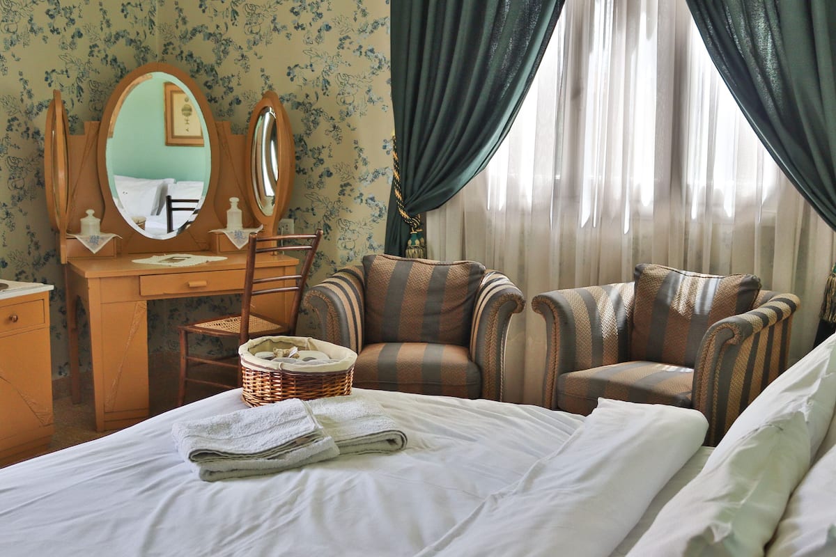 Deluxe Double Room, Private Bathroom, River View | Premium bedding, desk, laptop workspace, iron/ironing board