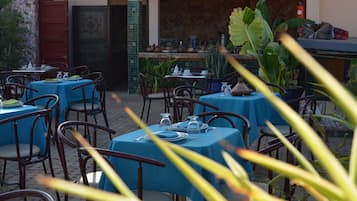 Breakfast, lunch, dinner served; local cuisine