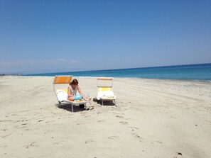 Beach nearby, sun loungers, beach towels