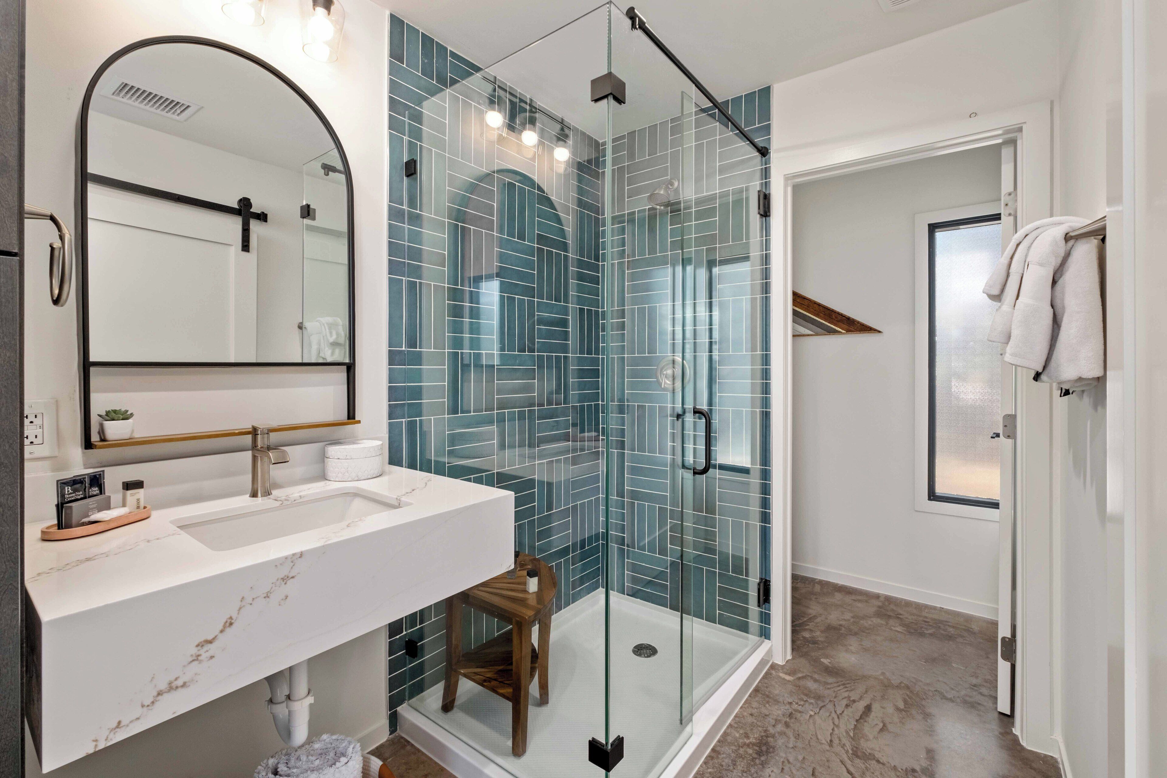 shower, hair dryer, bathrobes, towels