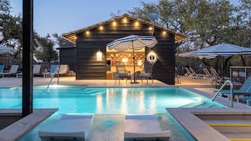 2 outdoor pools, open 10:00 AM to 10:00 PM, pool cabanas (surcharge)