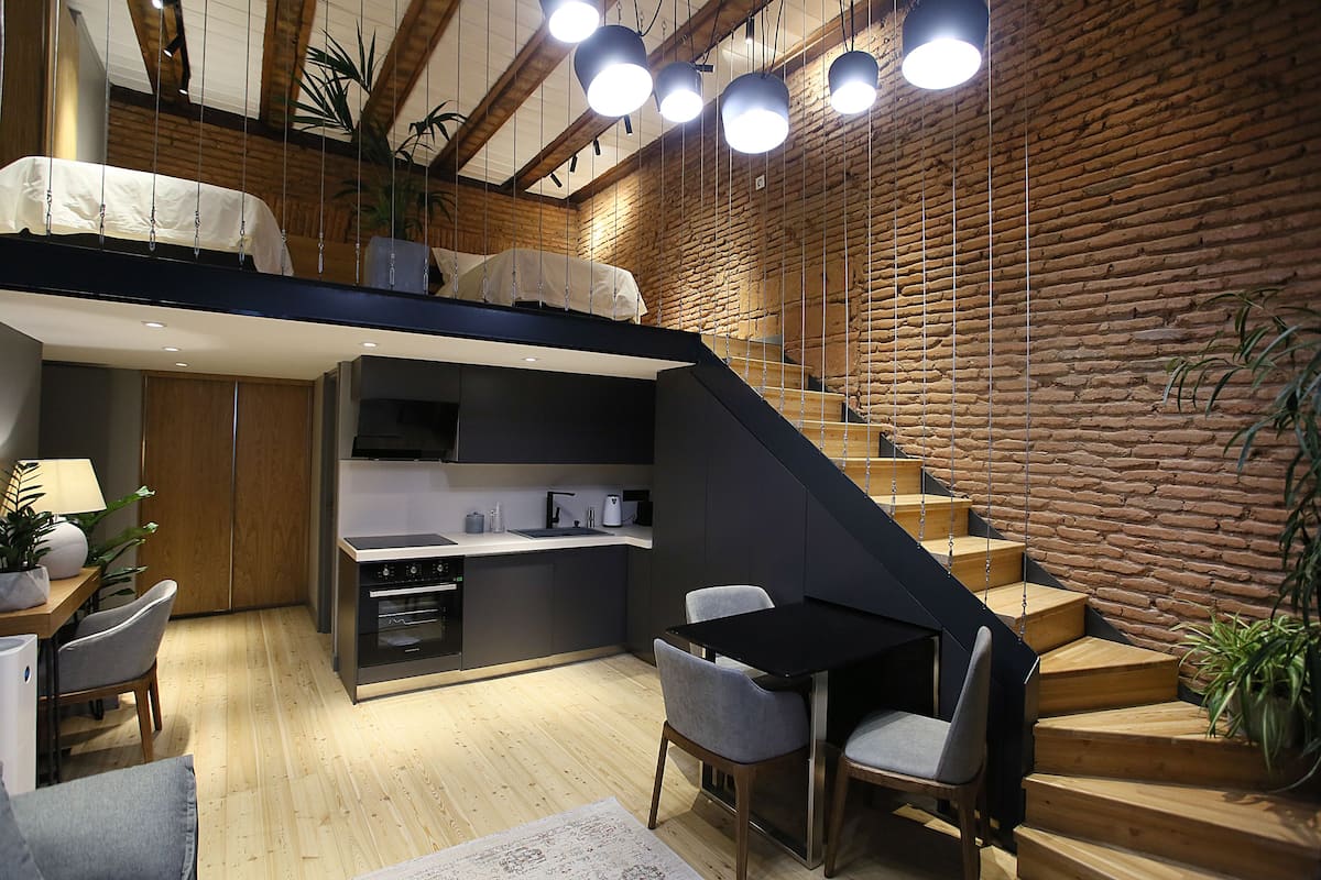 Design Suite, 2 Bedrooms | Private kitchen | Coffee/tea maker, full-size fridge, microwave, oven