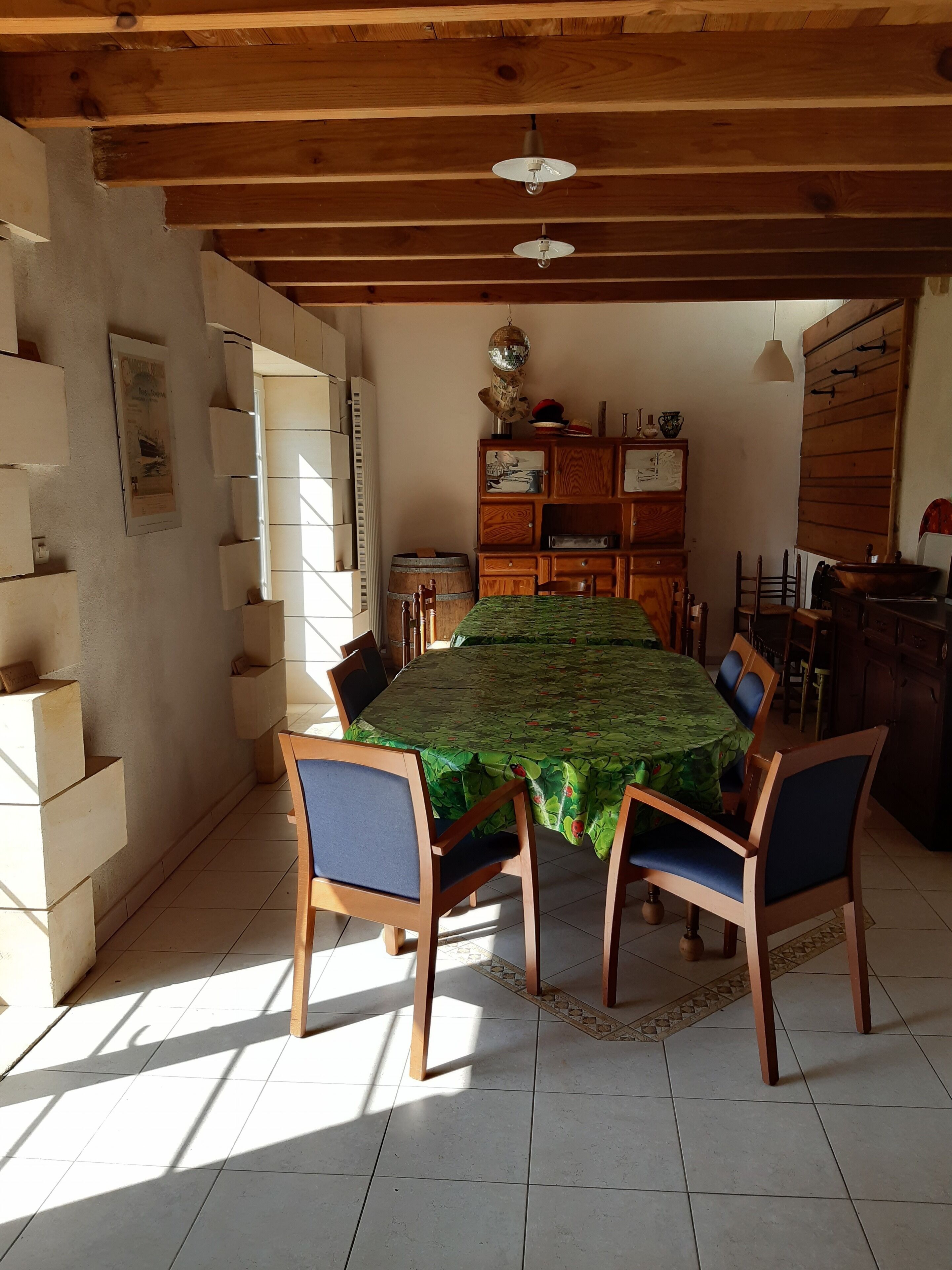 Large freestone house surrounded by large green spaces