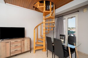 Classic Apartment, 1 Bedroom (7) | Living area | 32-inch flat-screen TV with cable channels, TV - A & D Apartments (Markopoulo Mesogaias)