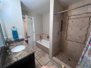 Bathtub, hair dryer, towels, soap - Nicely Updated heated Pool Home Near Private Beach (Vero Beach)