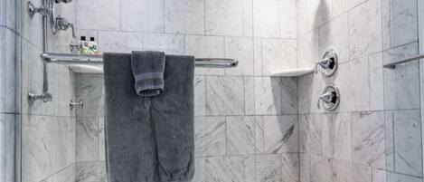 Combined shower/tub, hair dryer, towels, soap