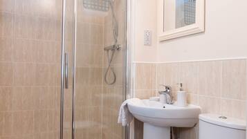Combined shower/bathtub, hair dryer, towels, soap
