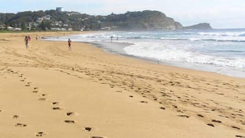 On the beach, sun loungers