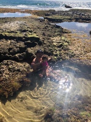 On the beach, sun loungers, beach towels