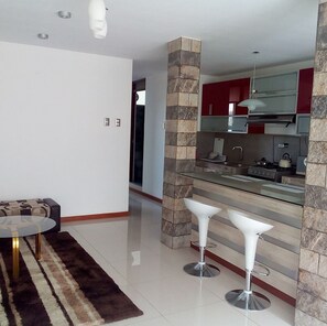 Apartment, 2 Bedrooms, Non Smoking | Living area | 32-inch Smart TV with cable channels, TV - H'epico Rent Apartments Piura (Piura)