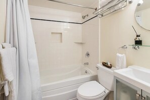 Combined shower/bathtub, hair dryer, towels, soap