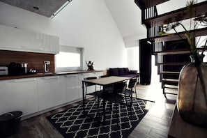 Apartament prèmium, vistes al jardí (1) | Sala d'estar | Televisor de pantalla plana 
