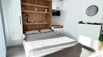 1 chambre, fer et planche à repasser, Wi-Fi gratuit, draps fournis