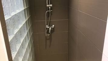 Shower, towels, soap, shampoo