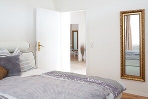 Deluxe Apartment, 3 Bedrooms | Desk, blackout drapes, soundproofing, iron/ironing board