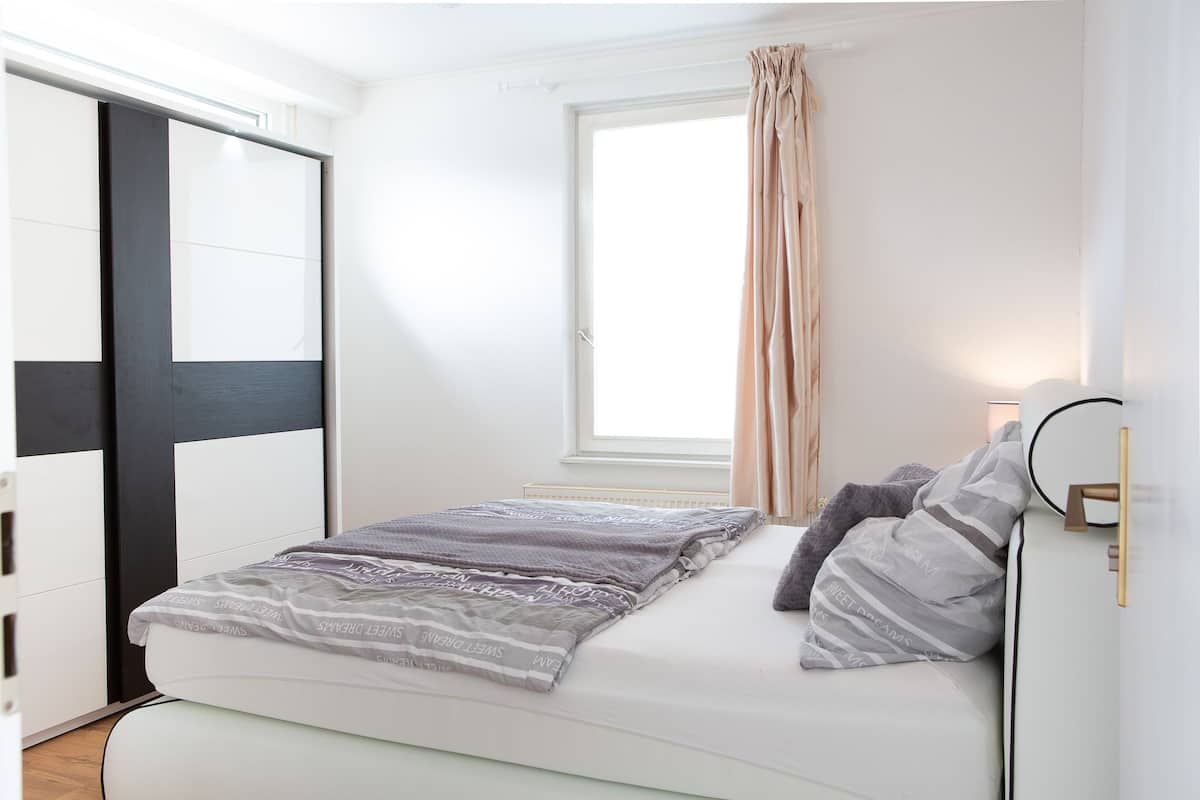 Deluxe Apartment, 3 Bedrooms | Desk, blackout curtains, soundproofing, iron/ironing board
