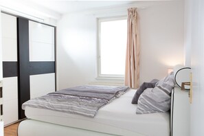Deluxe Apartment, 3 Bedrooms | Desk, blackout drapes, soundproofing, iron/ironing board
