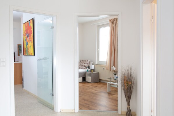 Deluxe Apartment, 3 Bedrooms | Desk, blackout drapes, soundproofing, iron/ironing board