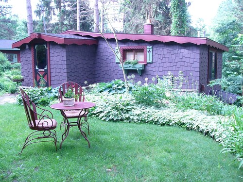 Enchanted Lakeside Cottage Nestled in Perennial Gardens
