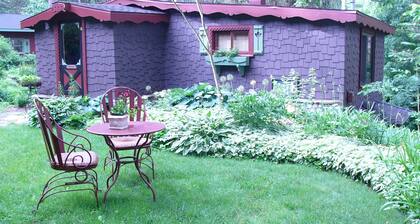 Enchanted Lakeside Cottage Nestled in Perennial Gardens
